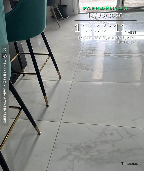 Kitchen splashback tiles and grout being detailed