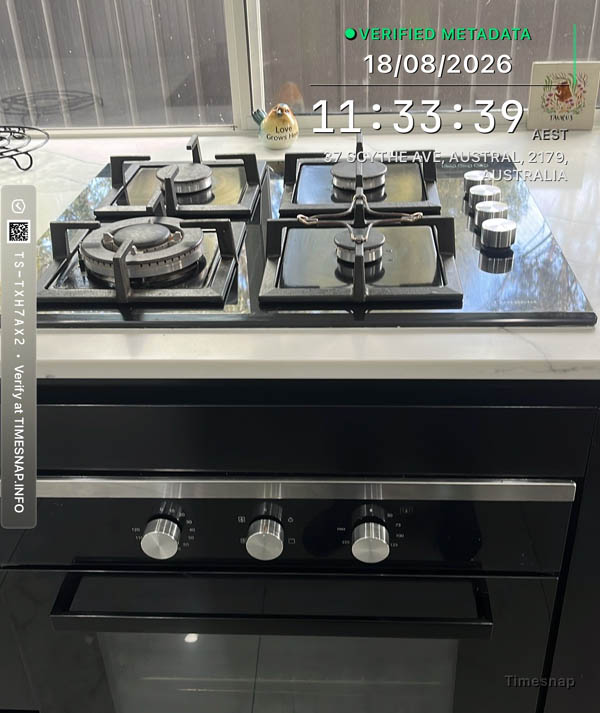 Kitchen benchtops and cupboard fronts detailed during a deep clean