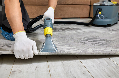 Carpet being steam extracted during a deep clean