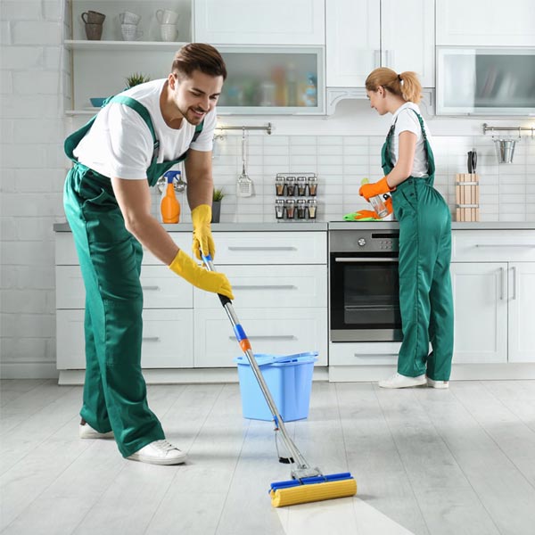 End of lease cleaning Sydney — mopping an empty rental kitchen
